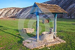 Natural water well made be stone