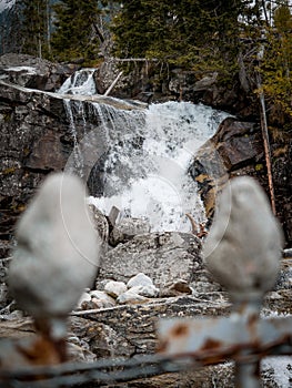 A natural waterfall by a hiking trail in the Tatras in Slovakia