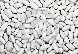 Natural white beans isolated on white background
