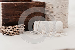 Natural White Macrame Cord on Soft White Background with Wooden Box