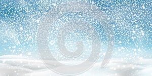 Natural Winter Christmas background with blue sky, heavy snowfall, snowflakes in different shapes and forms, snowdrifts