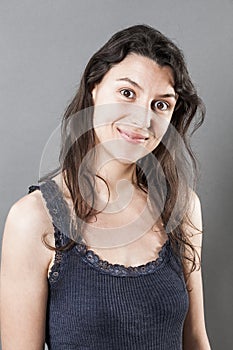 Natural woman with fine hair smiling expressing wellbeing photo