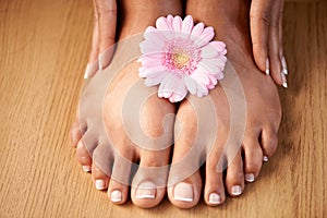 Natural woman and manicure with flower on feet for luxury cosmetic treatment with spa pedicure nails zoom. Healthy