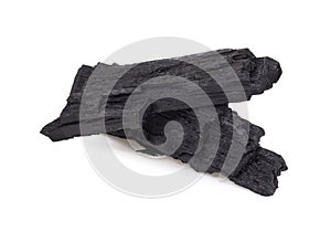 Natural wood charcoal isolated on white background