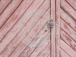 Natural wood plank shabby chic texture background with old padlock