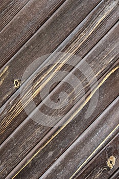 Natural wood texture. Brown old weathered planks for background. Diagonal arrangement