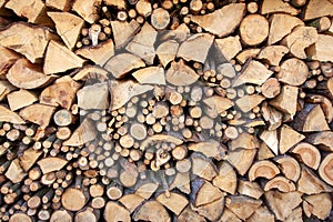 Natural wooden background - detailed chopped firewood