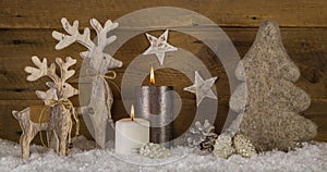 Natural wooden white brown christmas decoration with two burning