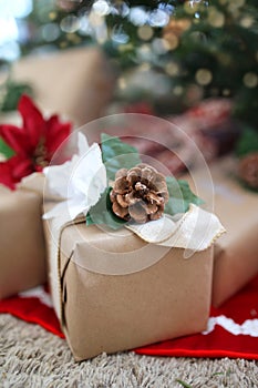 Natural Wrapped Christmas Present with Pinecone and Kraft Paper