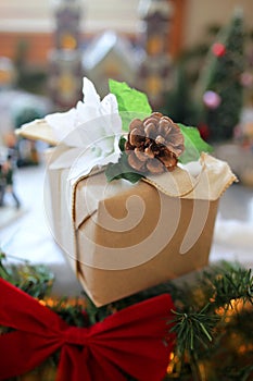 Natural Wrapped Christmas Present with Pinecone and Kraft Paper