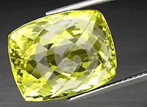 natural yellow citrine quartz gem on the background