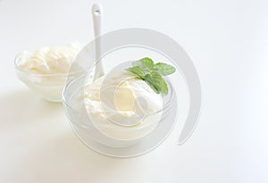 Natural yogurt or yoghurt with cream and mint