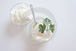 Natural yogurt or yoghurt with cream and parsley