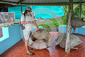 Naturalist talking about Galapagos giant tortoise shell at the s