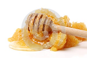 Naturally crystallized honey and dipper