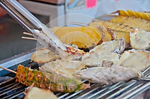 Naturally wild catched cheesy grilled giant oyster in local fisherman village in Tai O Hong Kong