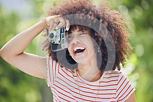 Nature, afro and black woman with photography camera taking happy picture memory with retro style. African hipster girl