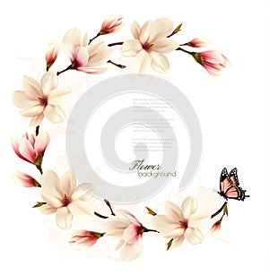 Nature background with blossom branch of white magnolia