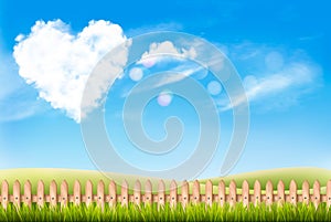 Nature background with blue sky and heart shape cloud.