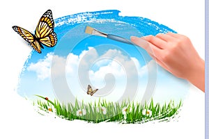 Nature background with butterflies and hand with brush.