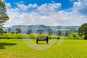 Nature background of landscape of Savanna Forest and mountain with a blue sky and white clouds in the spring afternoon at Thung