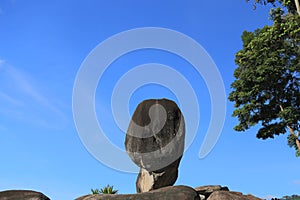 Nature balanced rock during morning time at the Hinpad mountain view, Suratthani South of Thailand.Stone set on a cliff