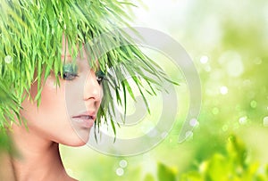 Nature beauty woman with fresh grass hair