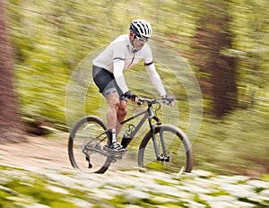 Nature, bicycle or fast sports man travel, ride and journey on off road adventure, outdoor challenge or bike exercise