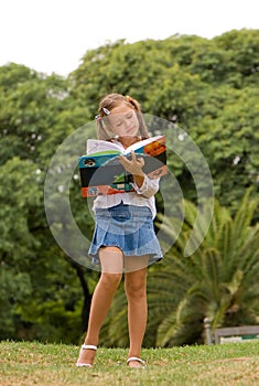 On the nature with the book photo