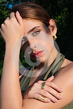 Nature close up portrait of young sensual woman outdoor. American woman portrait outdoors. Beautiful natural woman in