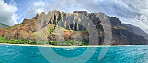 Nature coastline landscape in USA. Hawaii travel. Beautiful Na Pali coast, Kauai, Hawaii view from off shore sea sunset boat