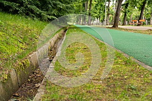 Nature concept grass and jogging lane in park