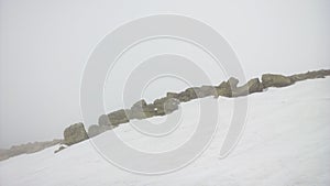 Nature covered in the snow during cold Winter in the country on the hills.