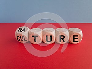 Nature and Culture symbol. Turned wooden cubes and changes the word culture to nature.
