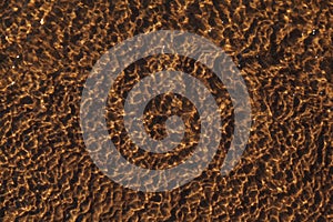 Nature design of reflection on nature pattern sand under sea water. Sand under water in nature as background