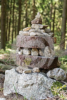 Stacking stones and piling them up - nature experience photo
