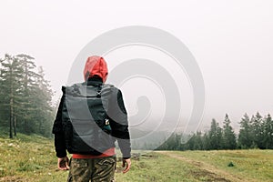 Nature explorer enjoying the view of mountain range