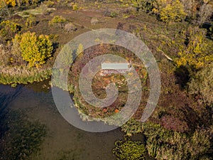 Nature and landscape: aerial view of a forest and lakes, autumn leaves, foliage, greenery and trees in a wilderness landscape