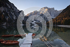 Nature landscape in the dolomites mountains, with long exposure, on a autumn sunny day and sunstars on the sky, Lago di braies, It photo