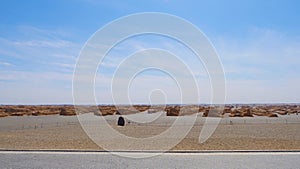 Nature landscape view of Yardang landform under sunny blue sky in Dunhuang UNESCO Global Geopark, Gansu China