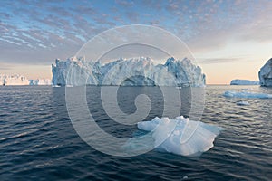 Nature and landscapes of Greenland or Antarctica. Travel on the ship among ices. Studying of a phenomenon of global warming Ices