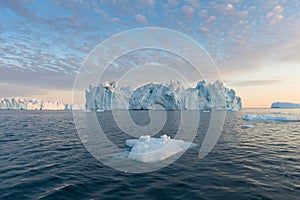 Nature and landscapes of Greenland or Antarctica. Travel on the ship among ices. Studying of a phenomenon of global warming Ices