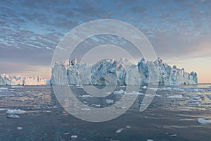 Nature and landscapes of Greenland or Antarctica. Travel on the ship among ices. Studying of a phenomenon of global warming Ices