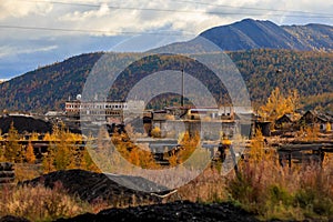 The nature of the Magadan region. An abandoned gold mining enterprise in the tundra of Russia. Abandoned mine buildings in the