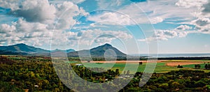 Nature of Mauritius, landscape with mountains and fields, panorama