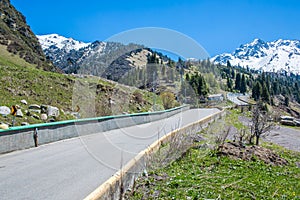 Nature of mountains, green trees and blue sky, road on Medeo in Almaty, Kazakhstan,Asia