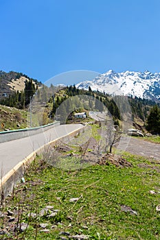 Nature of mountains, green trees and blue sky, road on Medeo in Almaty, Kazakhstan,Asia