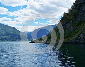 Nature Norway summer. Water, forest fjord on a Sunny day