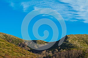 Nature places mountains and clouds, blue sky