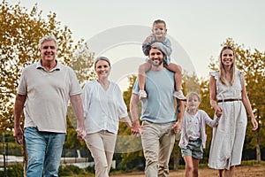 Nature, portrait and big family on a walk in the park for fresh air, exercise and adventure. Grandparents, parents and